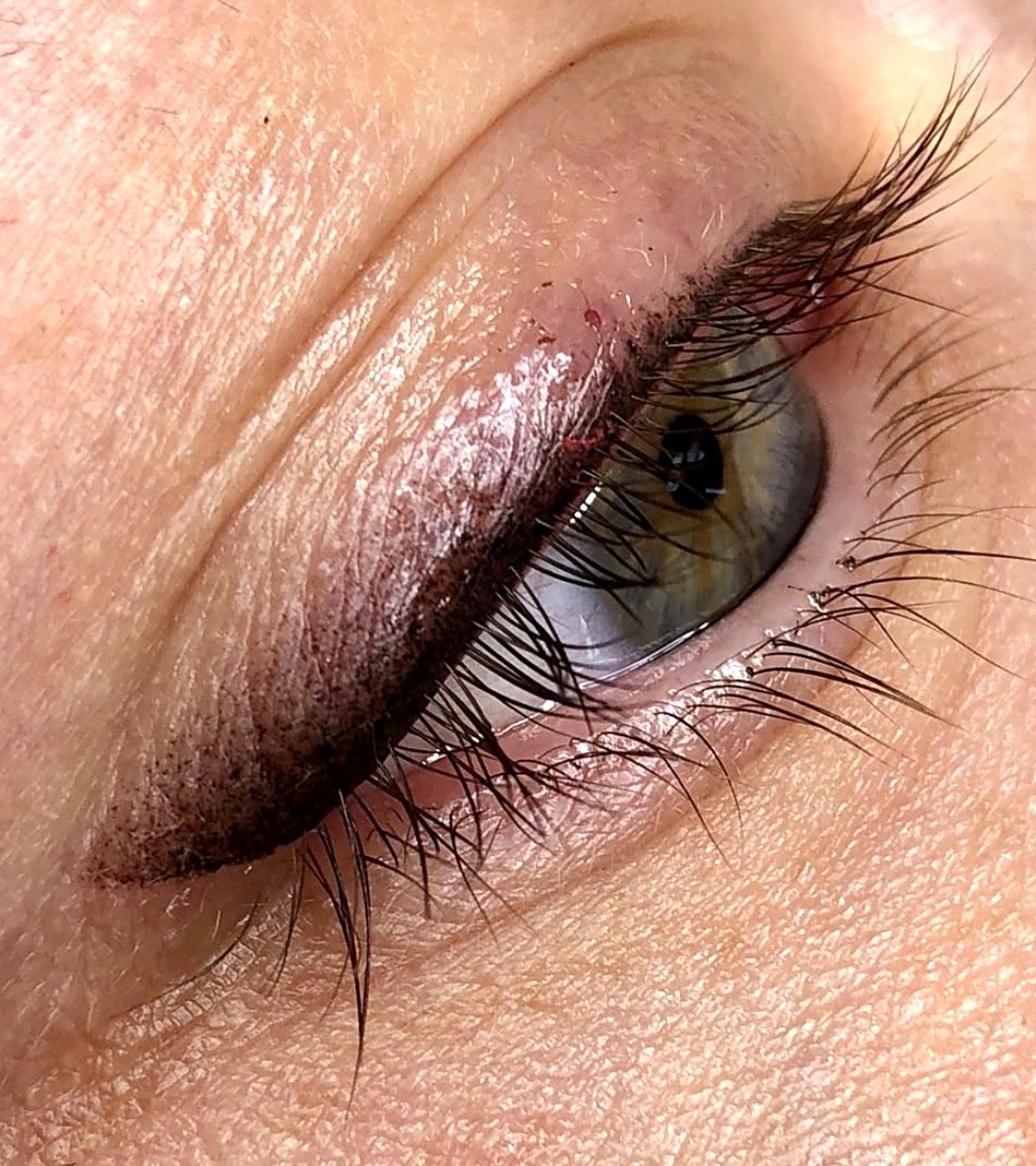 Shaded permanent eyeliner wing